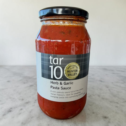 Jar of tar 10 Herb & Garlic Pasta Sauce on a marble surface